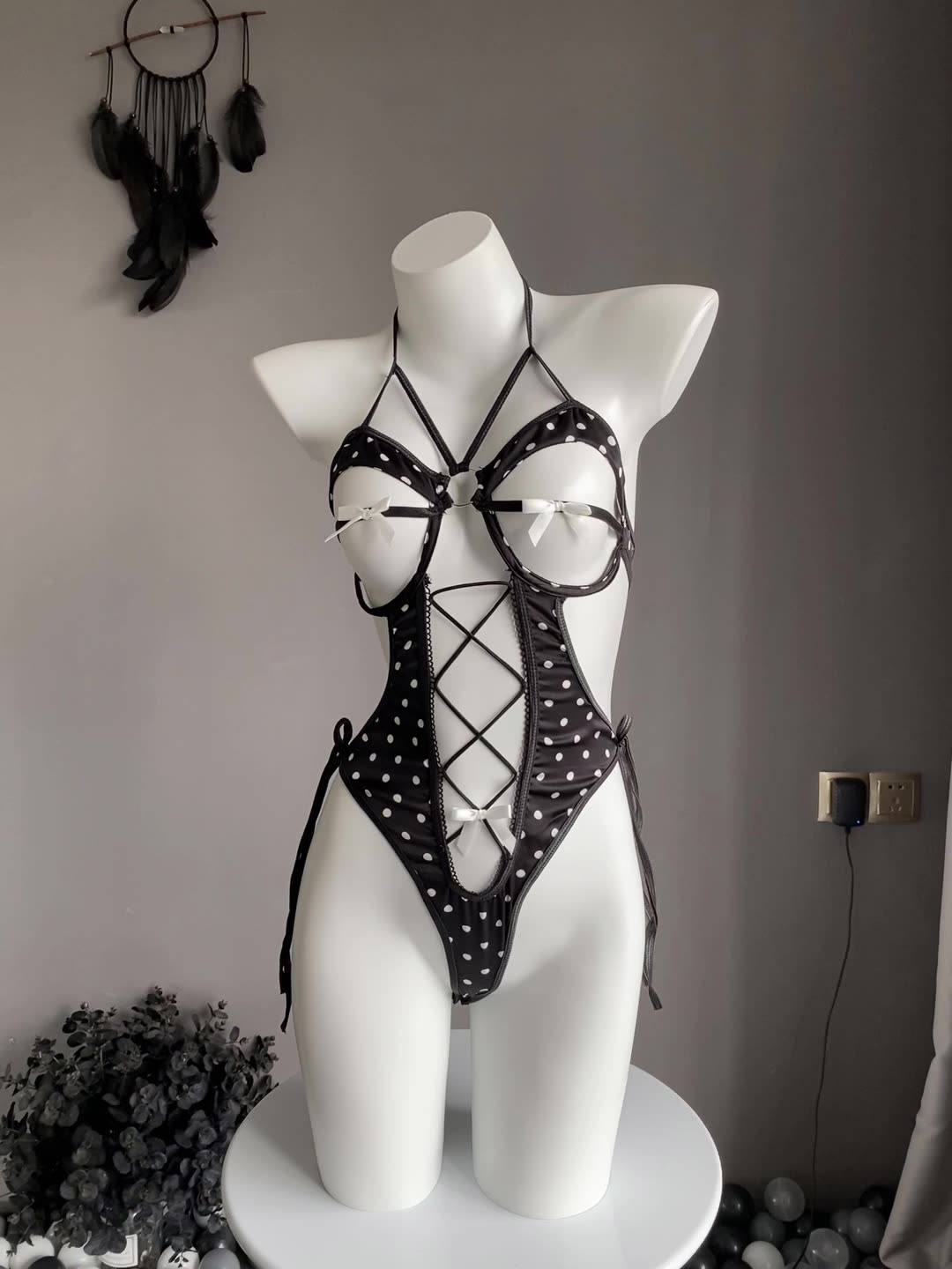 Cross Cut Chest Strap One-piece Suit On Bed